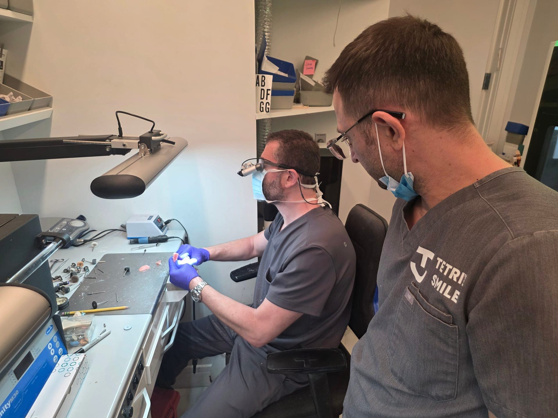 Two clinicians at the in-house laboratory bench at Tetri’s Smile, Sunny Isles Beach